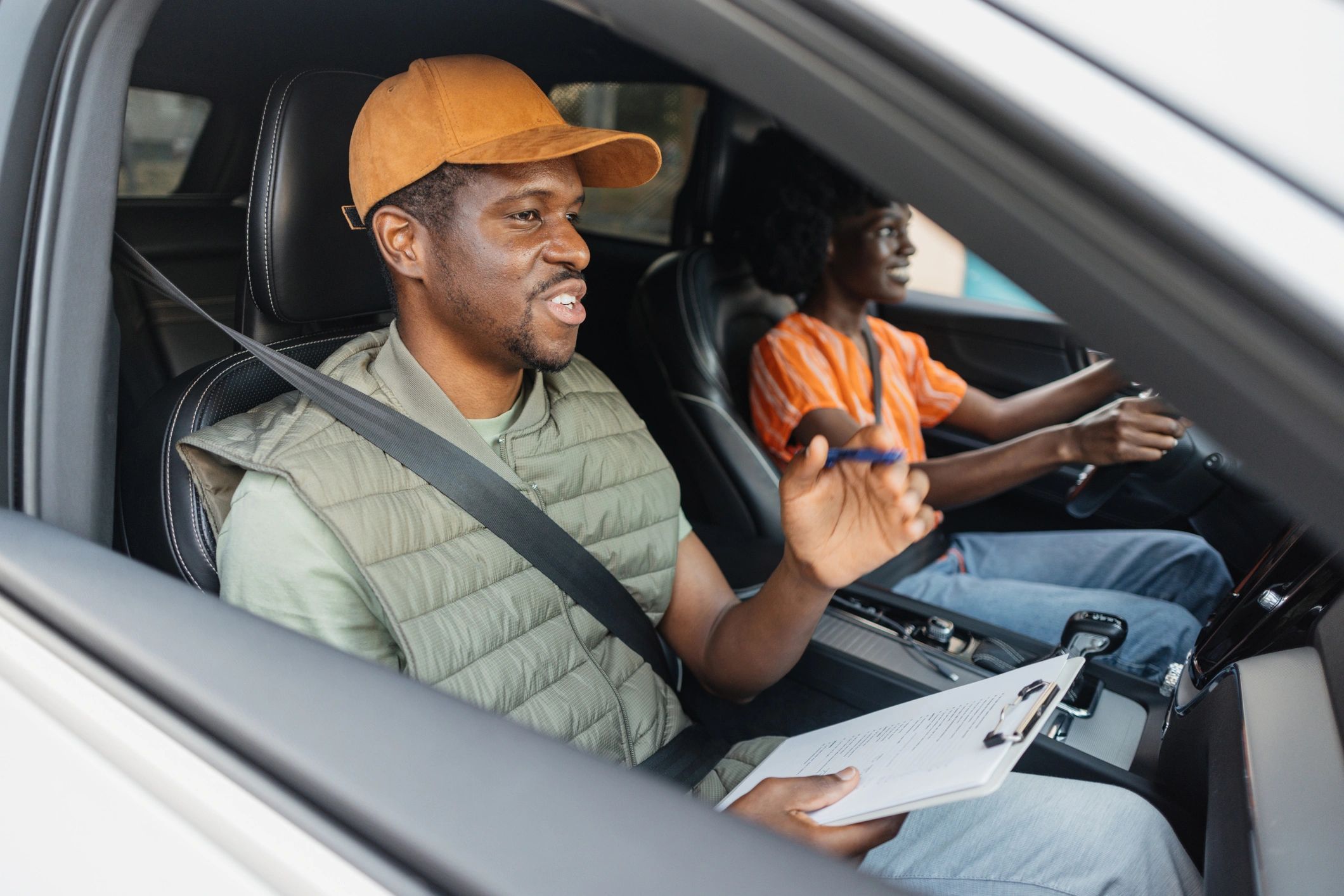 Instructor and student reviewing road safety materials